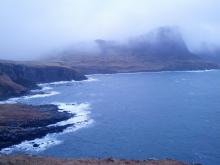 Mist and sheer cliffs at Isle of Skye